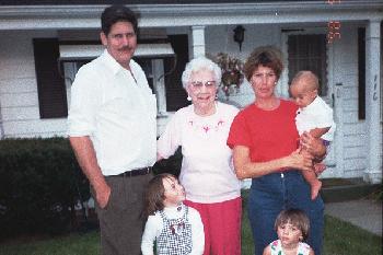 Debbie with kids Gramma & Steve